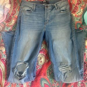 Flare jeans with rips in knees